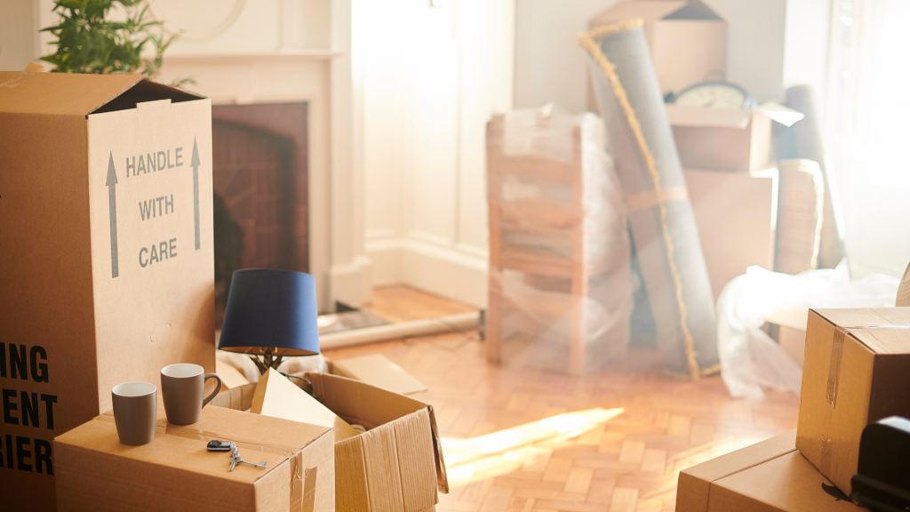 Moving boxes in an empty home, representing move-out cleaning before leaving a rental, condo, or house on Vancouver Island.